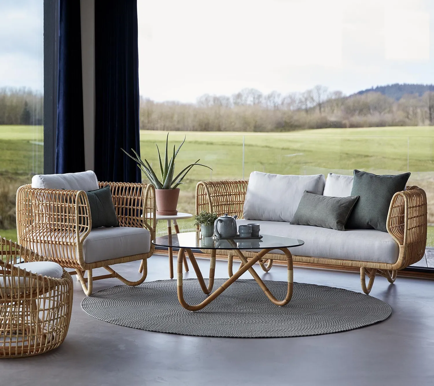 Cane-Line Nest loungestol natural rattan lysegrå