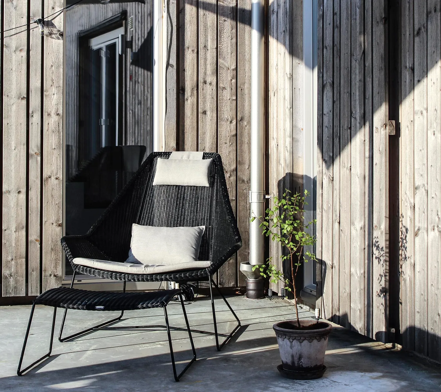 Cane-Line Breeze fodskammel black small round Weave