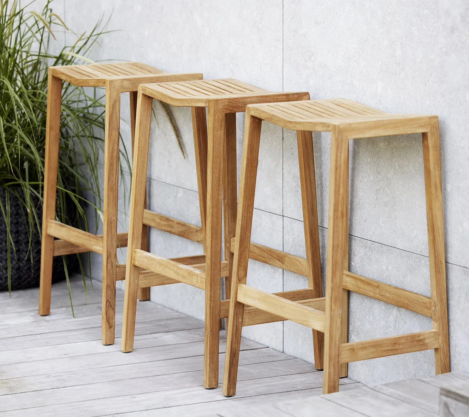 Cane-Line Flip barstol Teak høj fodstøtte